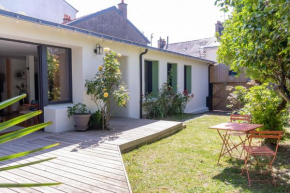 Charmante maison de plain-pied et son jardin fleuri